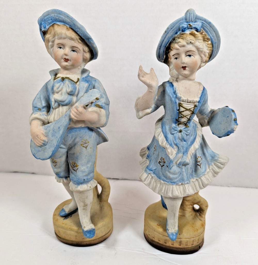 Vintage L & M INC. 8 1/2 '' TALL SET OF TWO BISQUE FIGURINES BOY & GIRL IN BLUE